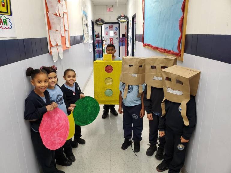 Kindergarten replicas of inventions by Garrett Morgan. 